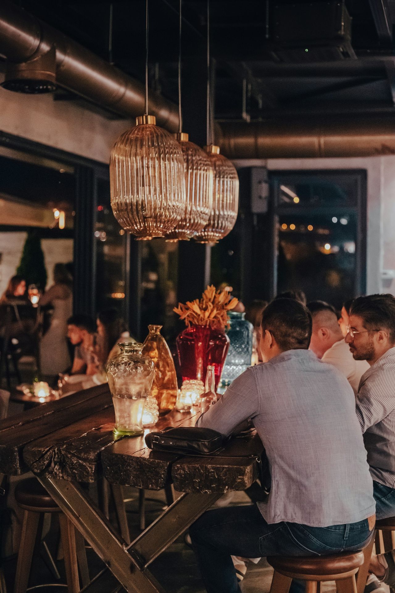 a group of people sitting at a table